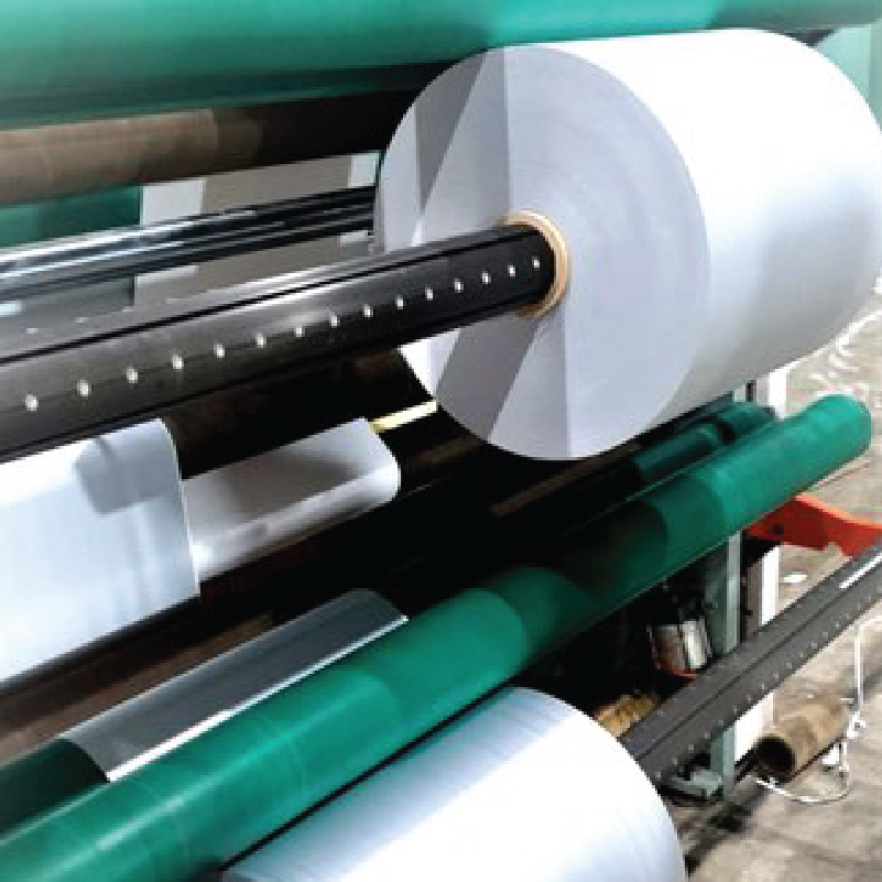 A machine with rolls of paper on it.