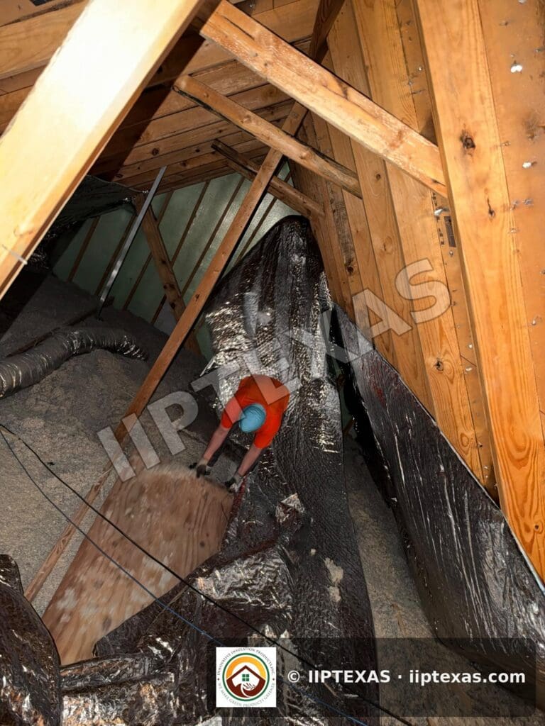 IIP Texas crew installing double bubble foil radiant barrier on attic rafters in the Dallas-Fort Worth area