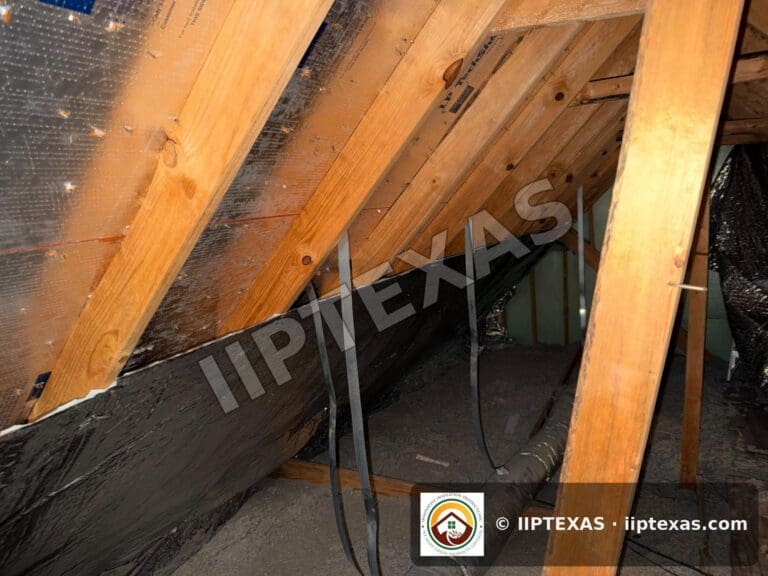 IIP Texas crew installing double bubble foil radiant barrier on attic rafters in the Dallas-Fort Worth area